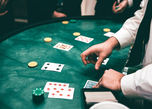 Image source: https://www.pexels.com/photo/people-playing-poker-3279691/